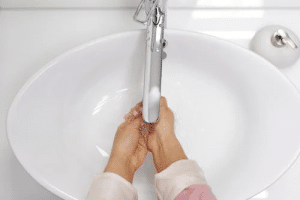 Woman Washing Her Hands With Soap