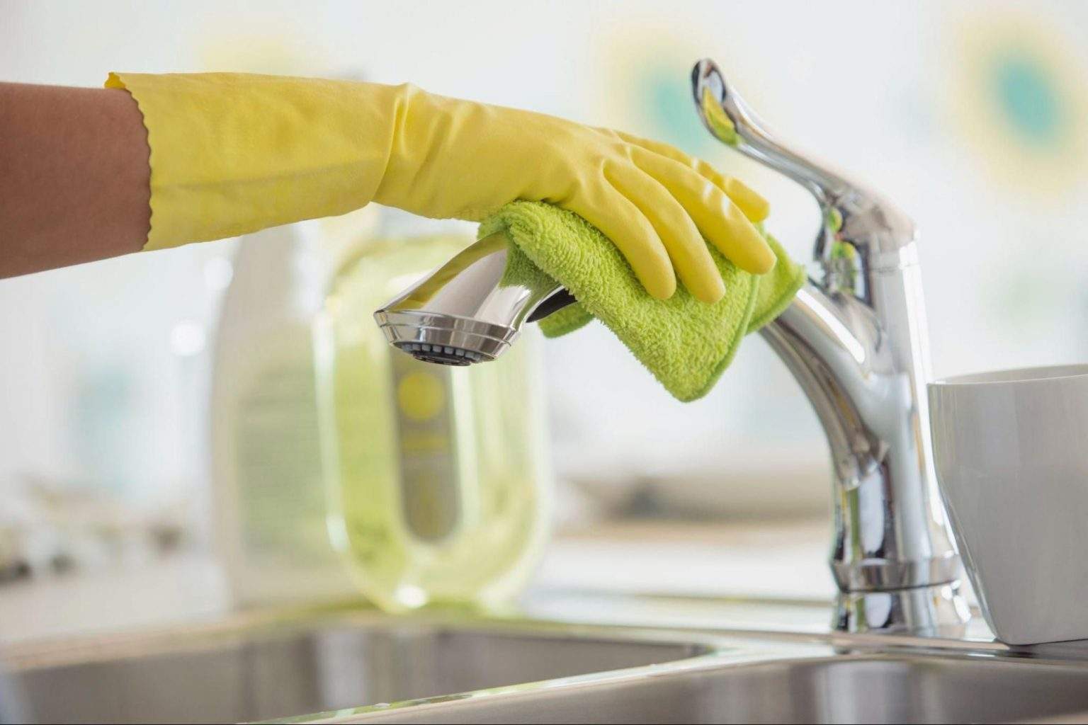 green buildup on bathroom sink faucet