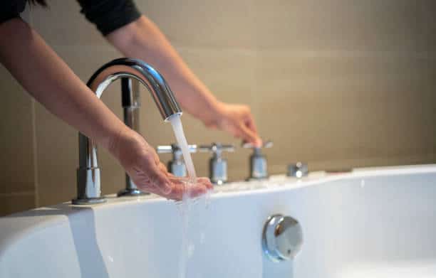 Deck-mounted faucet with hand shower