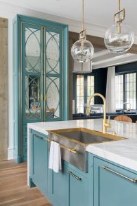 farmhouse sink with gold faucet